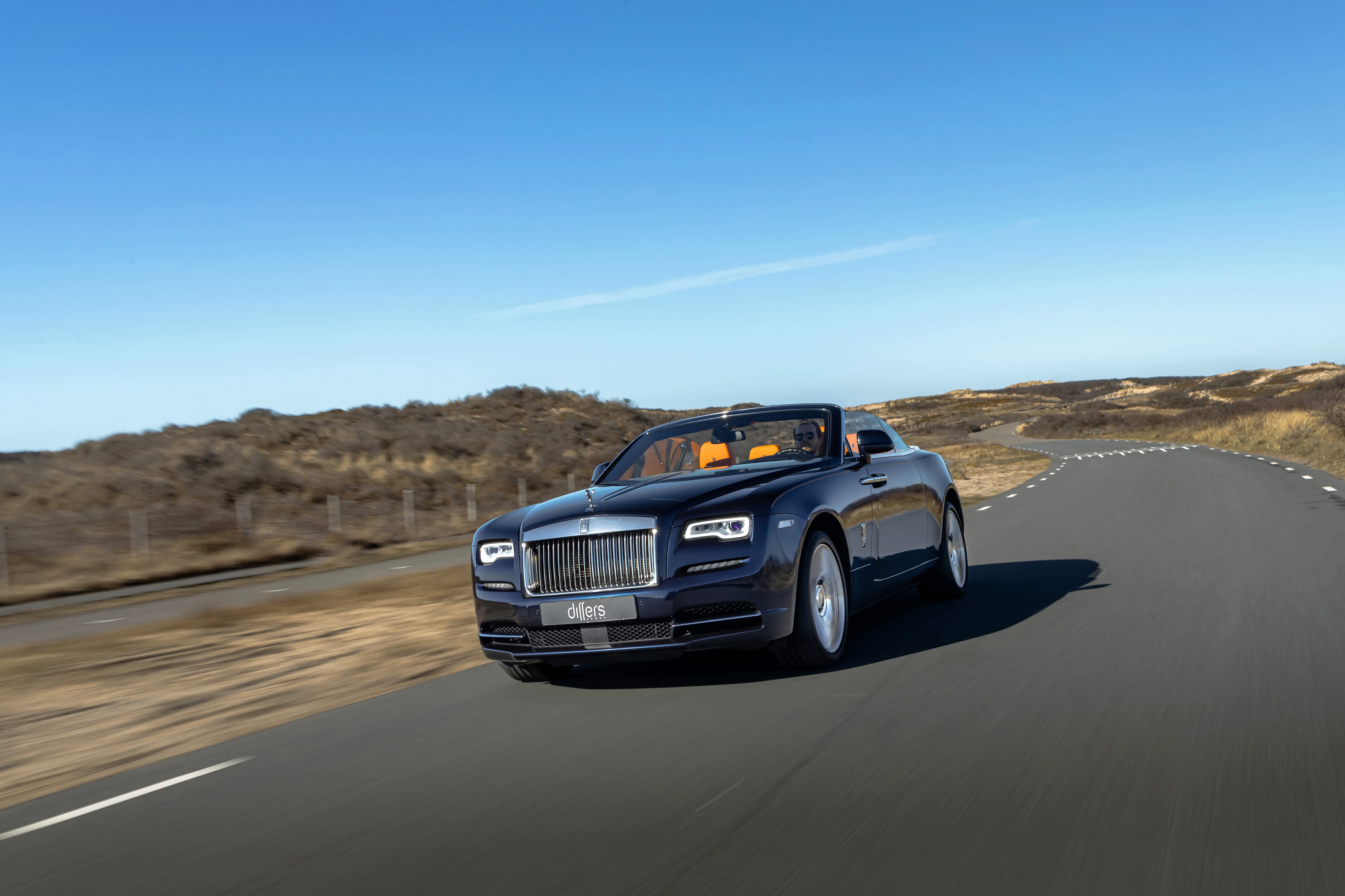 Rolls-Royce Dawn on coastal road